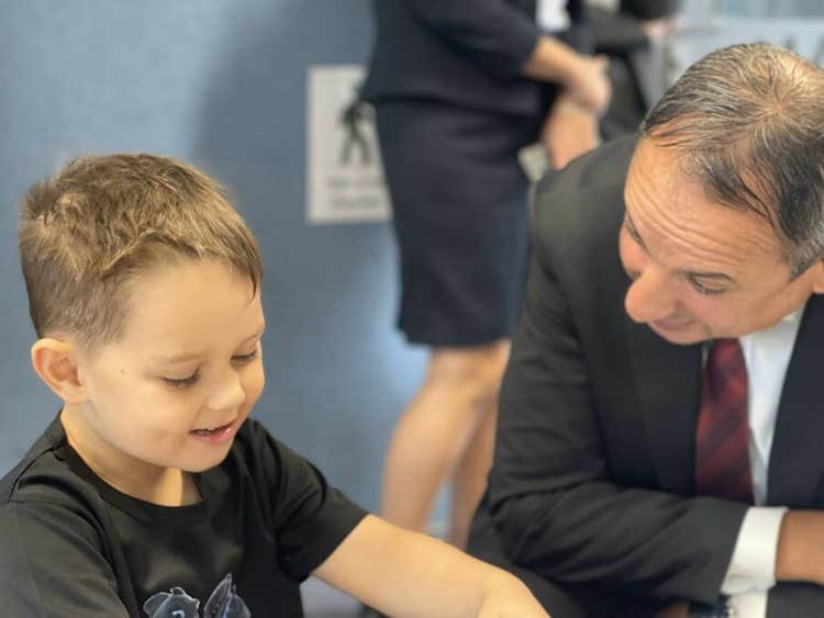 NSW Department of Education Secretary Murat Dizdar with Kindergarten student Jesse at the opening of Gymea Bay Public School's Inclusive Education Hub to support autistic students. Picture supplied